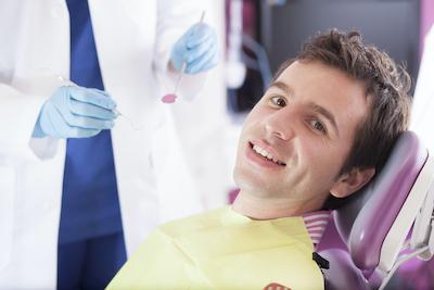 man at dentist in maple grove