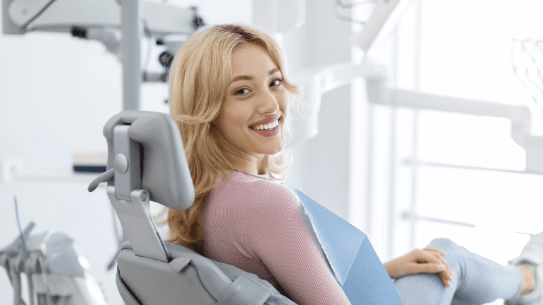 young woman at the dentist in maple grove mn
