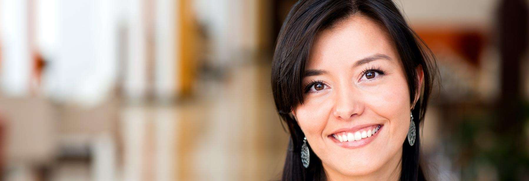 woman with porcelain veneers in maple grove